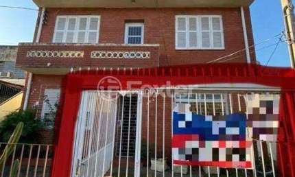 Casa com 4 quartos à venda na Rua Buarque de Macedo, 424, São Geraldo, Porto Alegre, 97 m2 por R$ 300.000