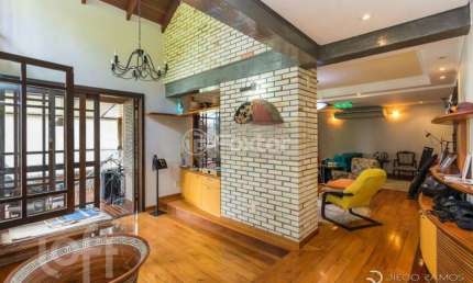 Casa em condomínio fechado com 4 quartos à venda na Rua Erechim, 100, Nonoai, Porto Alegre, 331 m2 por R$ 1.050.000