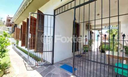 Casa com 3 quartos à venda na Avenida Teixeira Mendes, 298, Chácara das Pedras, Porto Alegre, 114 m2 por R$ 790.000