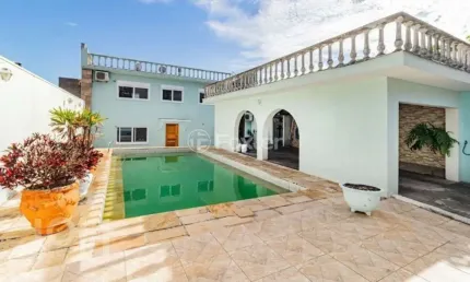 Casa com 4 quartos à venda na Rua Miracema, 134, Chácara das Pedras, Porto Alegre, 280 m2 por R$ 900.000