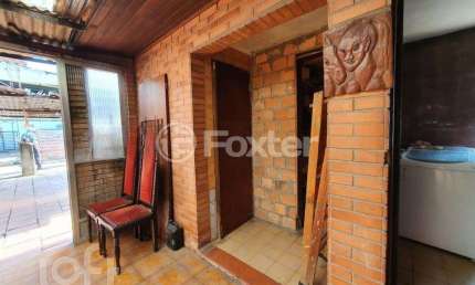 Casa com 3 quartos à venda na Rua Dona Margarida, 711, Navegantes, Porto Alegre, 240 m2 por R$ 600.000