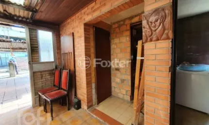 Casa com 3 quartos à venda na Rua Dona Margarida, 711, Navegantes, Porto Alegre, 240 m2 por R$ 600.000