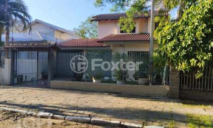 Casa com 3 quartos à venda na Rua Coronel Ricardo Machado, 80, Marechal Rondon, Canoas, 240 m2 por R$ 957.450