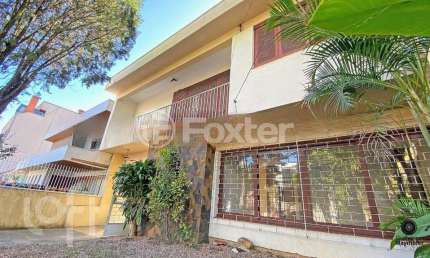Casa com 4 quartos à venda na Avenida José Gertum, 656, Chácara das Pedras, Porto Alegre, 264 m2 por R$ 1.350.000