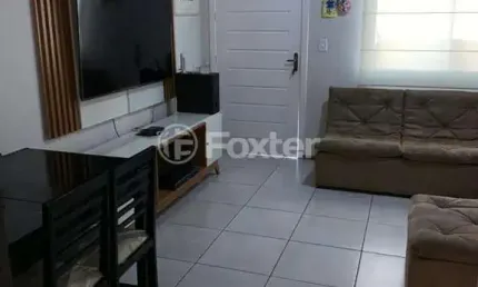 Casa em condomínio fechado com 2 quartos à venda na Rua Capitão Pedroso, 416, Restinga, Porto Alegre, 82 m2 por R$ 198.000