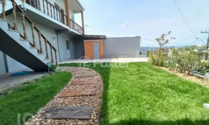 Casa com 3 quartos à venda na Rua Venâncio Aires, 935, Canudos, Novo Hamburgo, 253 m2 por R$ 689.700
