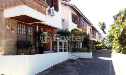Casa em condomínio fechado com 3 quartos à venda na Avenida da Cavalhada, 6021, Cavalhada, Porto Alegre, 136 m2 por R$ 630.000