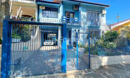 Casa com 4 quartos à venda na Rua Conselheiro Brusque, 189, Jardim Itu Sabará, Porto Alegre, 315 m2 por R$ 950.000