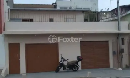 Casa com 3 quartos à venda na Avenida Tiradentes, 980, Aparecida, Alvorada, 215 m2 por R$ 424.000