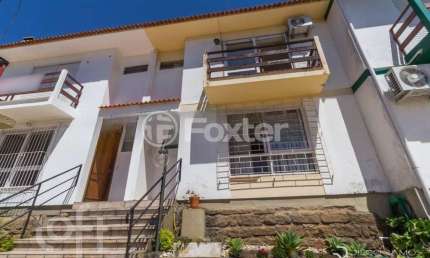 Casa em condomínio fechado com 3 quartos à venda na Rua Joaquim Cruz, 331, Santo Antônio, Porto Alegre, 156 m2 por R$ 799.000