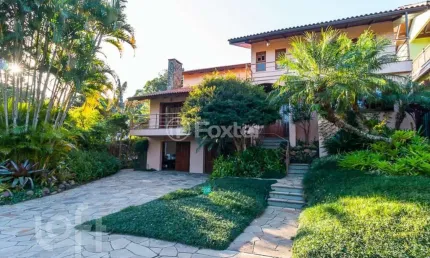 Casa em condomínio fechado com 5 quartos à venda na avenida firmino octávio bimbi, 255, cavalhada, porto alegre, 420 m2 por r$ 2.480.000