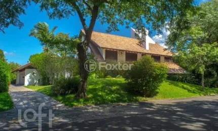 Casa com 6 quartos à venda na Avenida da Cavalhada, 5205, Cavalhada, Porto Alegre, 701 m2 por R$ 4.000.000