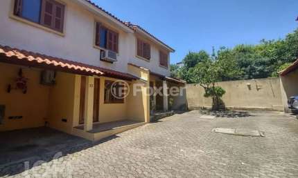 Casa em condomínio fechado com 3 quartos à venda na Rua Humberto de Campos, 601, Partenon, Porto Alegre, 96 m2 por R$ 370.000