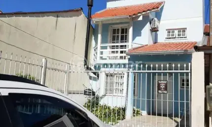 Casa com 3 quartos à venda na Rua Marcelo Küfner, 58, Hípica, Porto Alegre, 205 m2 por R$ 749.000