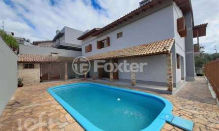 Casa com 4 quartos à venda na Rua Gustavo Leopoldo Feltes, 360, Canudos, Novo Hamburgo, 322 m2 por R$ 890.000