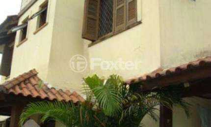 Casa em condomínio fechado com 3 quartos à venda na Rua Doutor Pereira Neto, 1334, Tristeza, Porto Alegre, 195 m2 por R$ 465.000