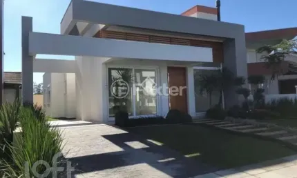 Casa em condomínio fechado com 3 quartos à venda na Avenida Central, 2000, Zona Nova, Capão da Canoa, 180 m2 por R$ 1.550.000