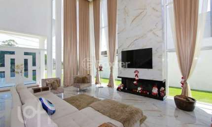 Casa em condomínio fechado com 5 quartos à venda na Avenida Juca Batista, 9000, Belém Novo, Porto Alegre, 388 m2 por R$ 4.780.000