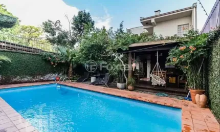 Casa com 5 quartos à venda na rua itaboraí, 1490, jardim botânico, porto alegre, 370 m2 por r$ 1.800.000