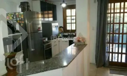 Casa com 3 quartos à venda na Rua Doutor Mário Totta, 1664, Tristeza, Porto Alegre, 165 m2 por R$ 700.000