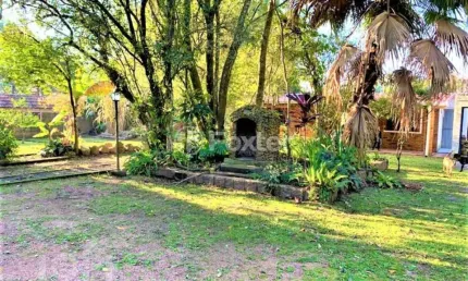 Casa com 4 quartos à venda na avenida desembargador mello guimarães, 235, belém novo, porto alegre, 181 m2 por r$ 750.000
