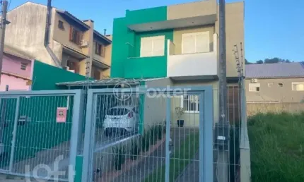 Casa com 2 quartos à venda na Rua Doutor Cláudio Walter Ferreira da Silva, 176, Guarujá, Porto Alegre, 108 m2 por R$ 350.000