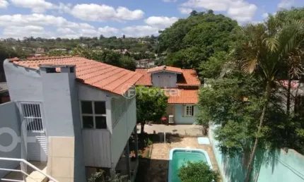 Casa com 4 quartos à venda na rua banco do comércio, 32, santa tereza, porto alegre, 155 m2 por r$ 650.000