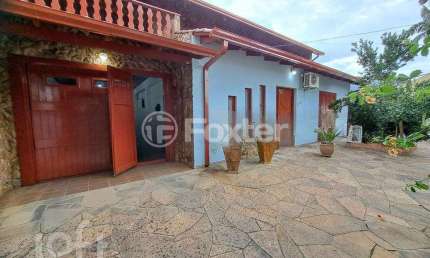 Casa com 4 quartos à venda na Rua das Araras, 1650, Harmonia, Canoas, 371 m2 por R$ 841.000