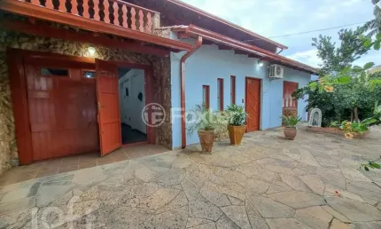 Casa com 4 quartos à venda na Rua das Araras, 1650, Harmonia, Canoas, 371 m2 por R$ 841.000