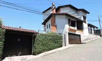 Casa com 3 quartos à venda na Rua Sarmento Leite, 2701, Exposição, Caxias do Sul, 239 m2 por R$ 1.100.000