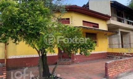 Casa com 3 quartos à venda na Rua Gomes de Freitas, 442, Jardim Itu Sabará, Porto Alegre, 275 m2 por R$ 780.000