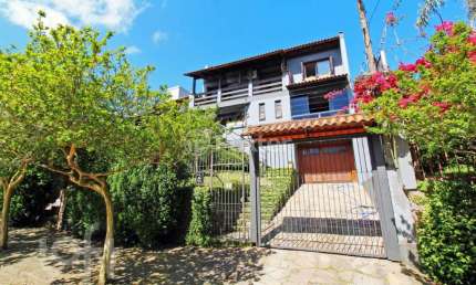 Casa com 4 quartos à venda na Rua Dona Lida Monteiro, 140, Teresópolis, Porto Alegre, 195 m2 por R$ 1.220.000