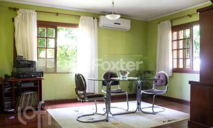 Casa com 4 quartos à venda na Rua Lola de Oliveira, 95, Parque Santa Fé, Porto Alegre, 298 m2 por R$ 1.795.500