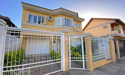 Casa com 4 quartos à venda na Rua Itaboraí, 1009, Jardim Botânico, Porto Alegre, 355 m2 por R$ 2.800.000