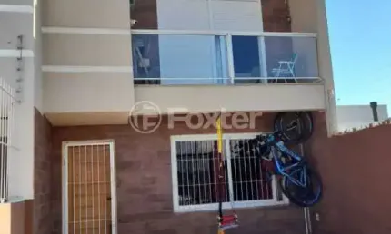 Casa com 3 quartos à venda na Avenida Armando Fajardo, 2823, Igara, Canoas, 100 m2 por R$ 690.000