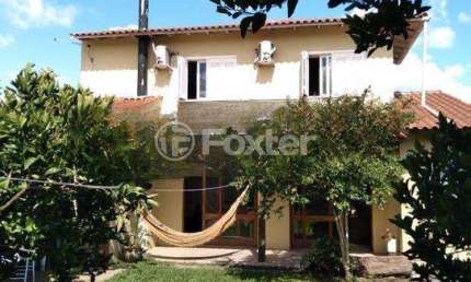 Casa com 4 quartos à venda na Rua Coronel Camisão, 123, Harmonia, Canoas, 130 m2 por R$ 750.000