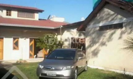 Casa com 3 quartos à venda na Rua José Maia Filho, 1179, Harmonia, Canoas, 147 m2 por R$ 687.800