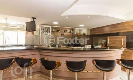 Casa com 4 quartos à venda na Rua País de Gales, 401, Marechal Rondon, Canoas, 304 m2 por R$ 1.850.000
