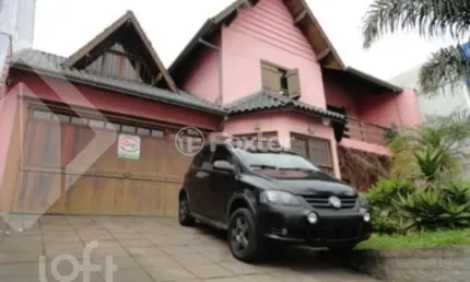 Casa com 3 quartos à venda na Rua Bento Gonçalves, 8092, Nossa Senhora de Lourdes, Caxias do Sul, 199 m2 por R$ 1.850.000
