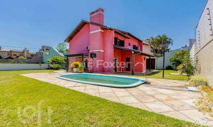 Casa com 3 quartos à venda na Rua Bélgica, 26, Marechal Rondon, Canoas, 270 m2 por R$ 2.100.000