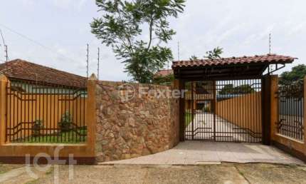 Casa com 3 quartos à venda na Rua Buttenbender, 835, Fátima, Canoas, 198 m2 por R$ 1.200.000