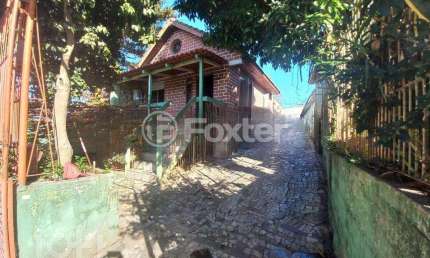 Casa com 2 quartos à venda na Rua Bartolomeu Dias, 653, Jardim Itu Sabará, Porto Alegre, 617 m2 por R$ 640.000
