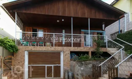 Casa com 4 quartos à venda na Avenida Doutor Sezefredo Azambuja Vieira, 5729, Olaria, Canoas, 300 m2 por R$ 620.000