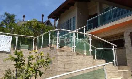 Casa com 4 quartos à venda na Rua Senador Annibal Di Primio Beck, 151, Boa Vista, Porto Alegre, 451 m2 por R$ 1.690.000