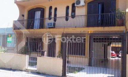 Casa com 4 quartos à venda na Rua Márcio Dias, 340, Nonoai, Porto Alegre, 450 m2 por R$ 700.000