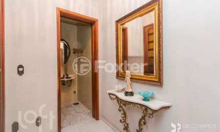 Casa com 5 quartos à venda na Rua Tomaz Edison, 416, Santo Antônio, Porto Alegre, 592 m2 por R$ 850.000
