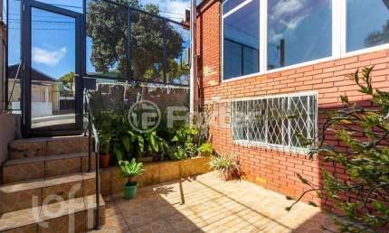 Casa com 3 quartos à venda na Rua Batista Xavier, 289, Partenon, Porto Alegre, 123 m2 por R$ 446.500