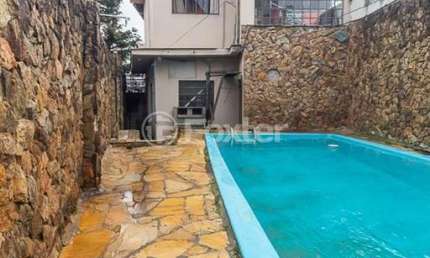 Casa com 3 quartos à venda na Avenida Mariland, 30, Auxiliadora, Porto Alegre, 190 m2 por R$ 1.200.000