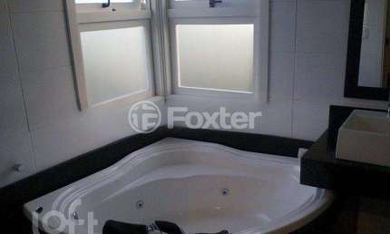 Casa em condomínio fechado com 3 quartos à venda na Rua Guatambu, 833, Hípica, Porto Alegre, 256 m2 por R$ 800.000