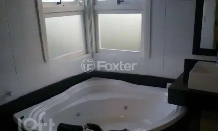 Casa em condomínio fechado com 3 quartos à venda na Rua Guatambu, 833, Hípica, Porto Alegre, 256 m2 por R$ 800.000